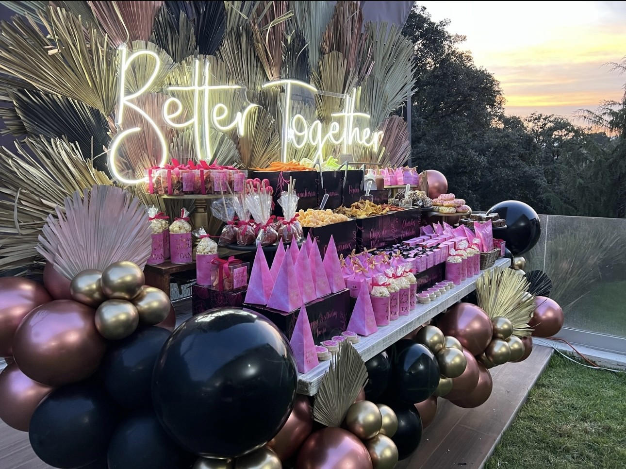 Desk with leather desk pad, walnut desk organizer, wireless keyboard and mouse, and porcelain mug.